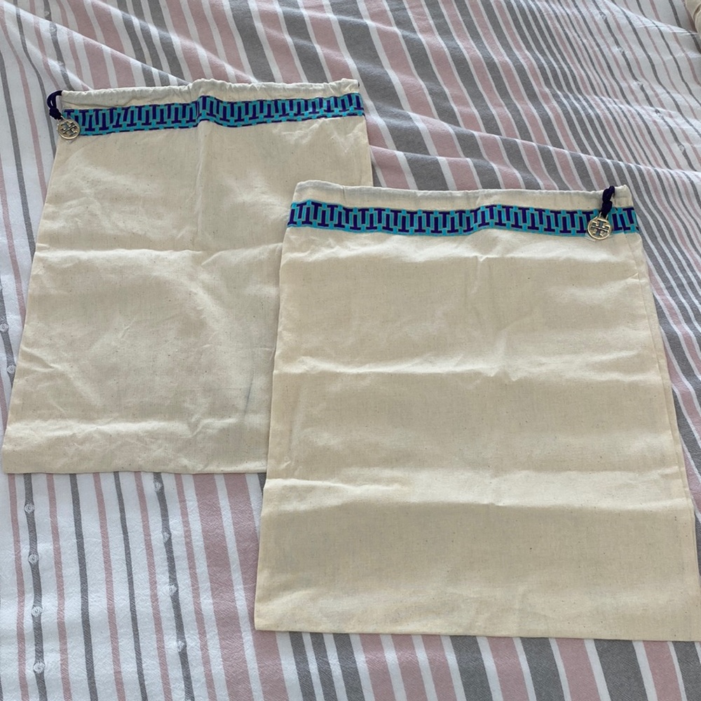 Tory Burch Miller sandal duster bags.